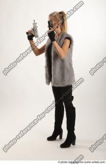 NIKOL STANDING POSE WITH TWO GUNS